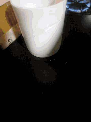 a 50 cent piece of paper is laying on a table
