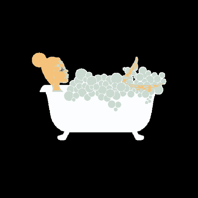 a woman is taking a bath in a tub full of bubbles