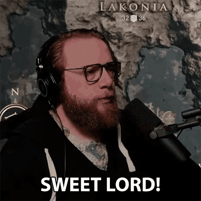 a man wearing headphones and glasses says sweet lord in front of a map