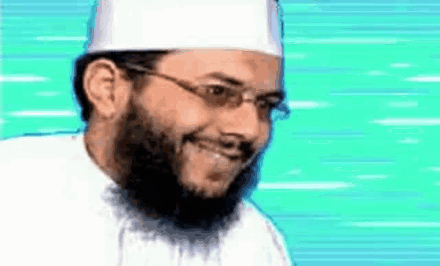 a man with a beard is wearing glasses and a white hat .