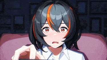 a girl with short black hair and red highlights is sitting on a couch