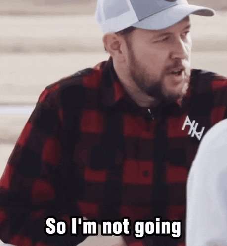 a man says so i 'm not going while wearing a plaid shirt