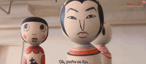 a group of dolls are standing next to each other with one saying oh you 're no fun