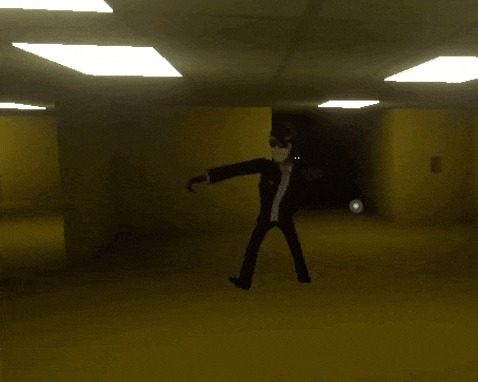 a man in a suit and tie is running through a hallway .