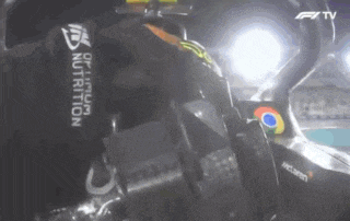 a close up of a steering wheel that says mclaren