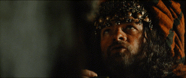 a man with a beard and a crown says il vous faut du baton dans la queue pour amorcer le mouvement