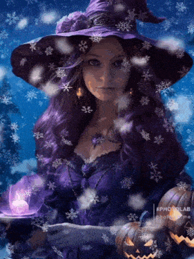 a witch with purple hair is holding a pumpkin and a cup of tea