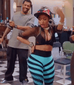 a man and a woman are dancing together in a room