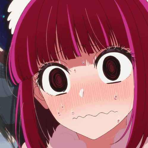 a close up of a girl 's face with a surprised expression