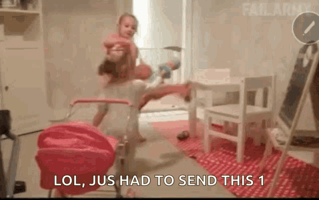 a little girl is playing in a room with a stroller and a table and chairs .
