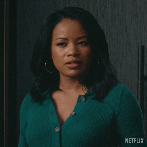 a woman in a green shirt says what 's wrong netflix