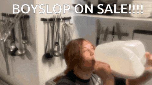 a woman drinking milk from a plastic container with the words boyslop on sale written above her
