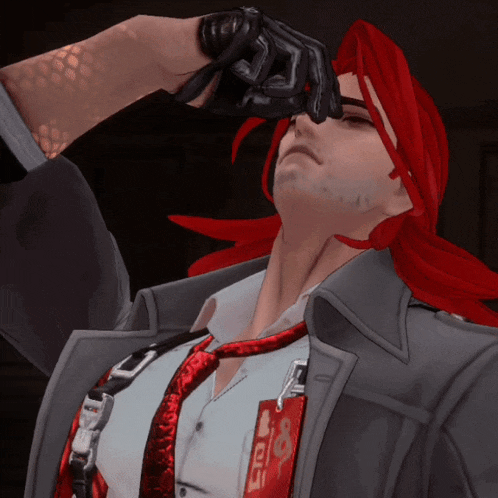 a man with red hair is wearing a jacket and tie with a badge that says ' eo ' on it
