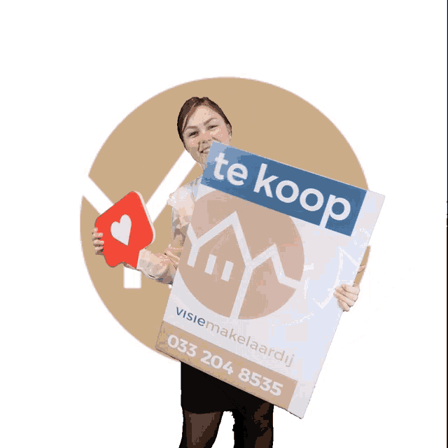 a woman holding a sign that says ' te koop ' on it