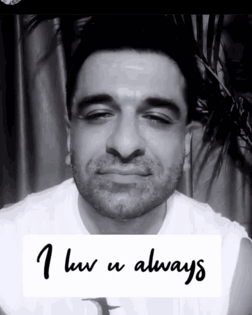 a black and white photo of a man with the words " i love u always " written below him