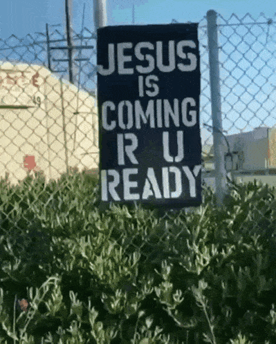 a sign that says " jesus is coming r u ready "
