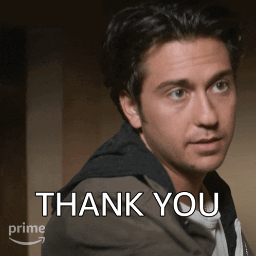 a man in a brown jacket says thank you in white letters