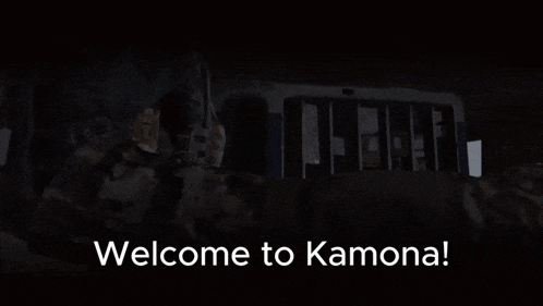 a screen says welcome to kamona with a man laying on the ground