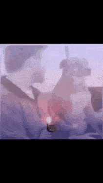 a blurry picture of a man and a dog holding hands