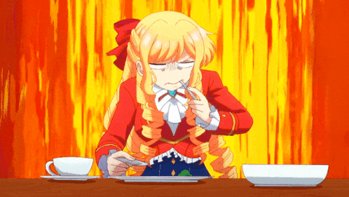 a girl is sitting at a table eating a plate of food with a fork and knife .