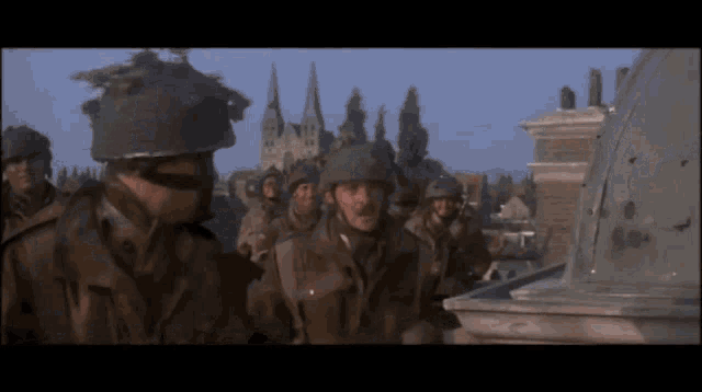 a group of soldiers standing in front of a church