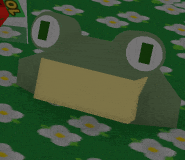 a green and yellow frog is sitting on a green carpet with daisies .