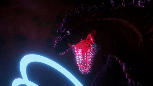 a close up of a monster with glowing red teeth
