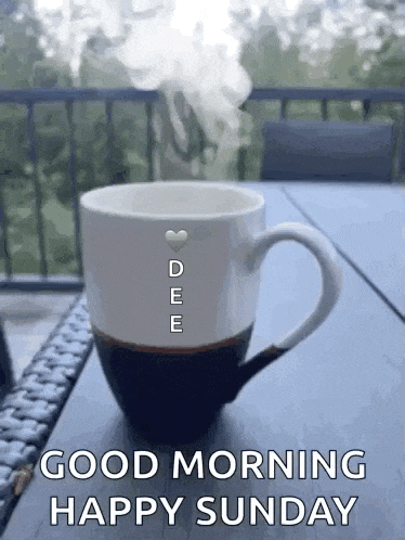 a cup of coffee with steam coming out of it and the words `` good morning happy sunday '' .