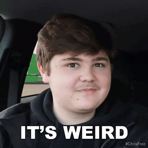 a young man sitting in a car with the words " it 's weird " written on his face
