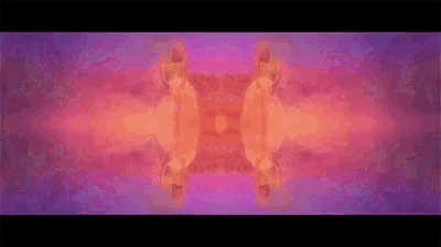 it looks like a kaleidoscope with a purple and orange background