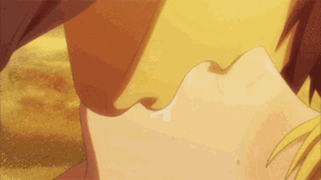 a close up of a person kissing another person