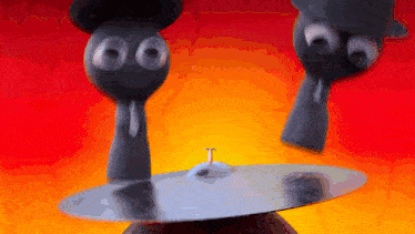 a cymbal with a t on it is on a table