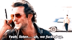 a man wearing sunglasses is talking on a cell phone and saying `` yeah , listen ... uh , we fucked up ''