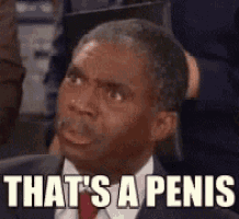 a man in a suit and tie is making a funny face and saying that 's a penis .