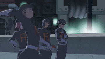 a couple of anime characters standing next to each other in a dark room