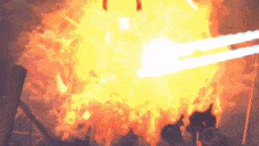 a large explosion with a lot of fire coming out of it .