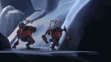 a couple of robots are standing next to each other and one of them has the letter o on its head