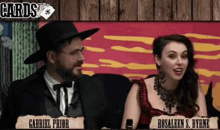 gabriel prior and rosaleen s. byrne are sitting in front of a wooden wall