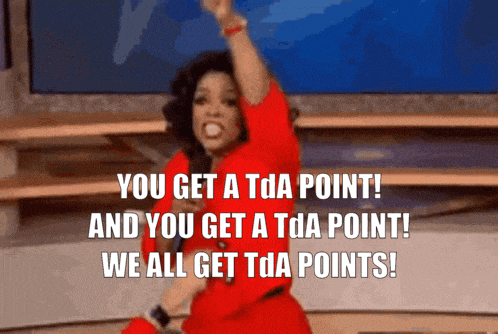 a woman in a red dress says " you get a tda point "