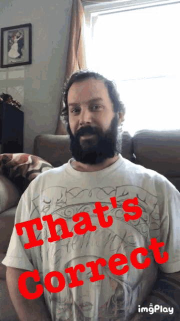 a man with a beard is wearing a white shirt that says that 's correct