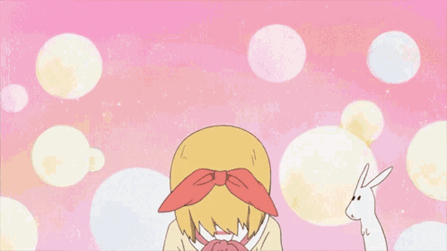 a girl with a red bow on her head is smiling