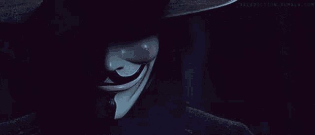 a close up of a person 's face with a mask on .