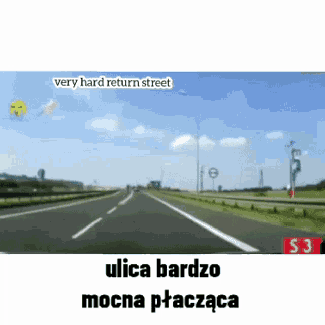 a car is driving down a highway with a kite flying in the background .