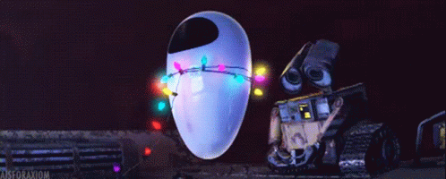 Wall E Eva GIF - Wall E Eva Christmas Lights GIFs