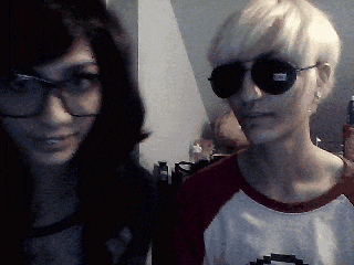 a man and a woman wearing sunglasses and glasses