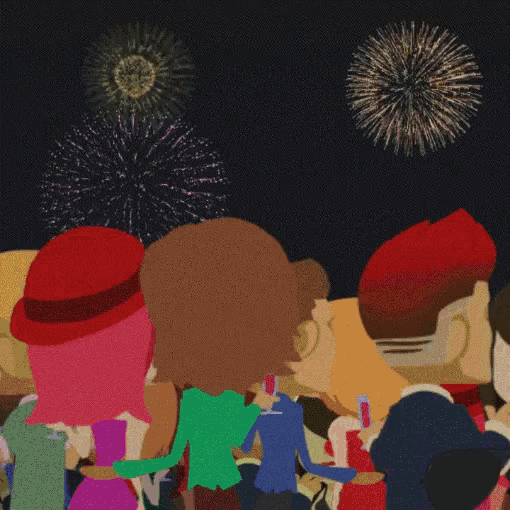 a group of people are watching fireworks and one of them has the letter h on her hat