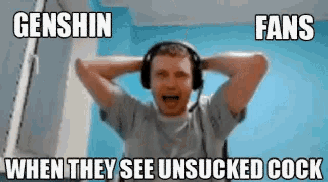 a man wearing headphones is screaming while holding his hands to his head .