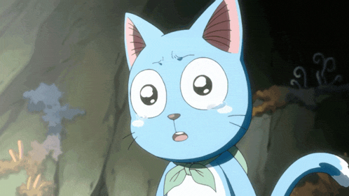 a blue and white cat with a bow on its neck