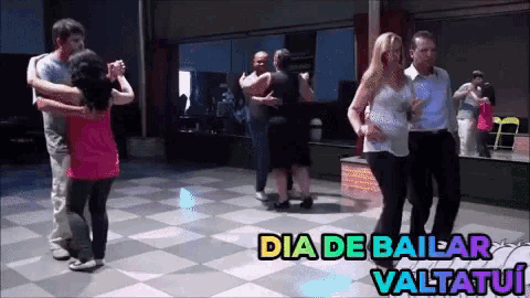 a group of people are dancing in a room with the words dia de bailar valtatui below them