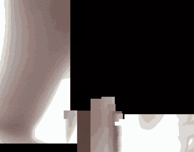 a blurred image of a person 's torso with a black border